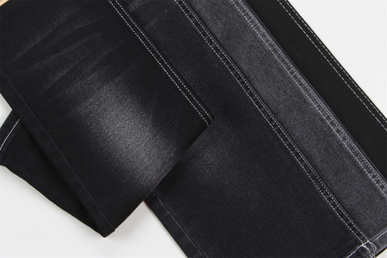 Precio barato 10 oz de poliéster espandéx denim negro con elasticidad tejido de denim para jeans