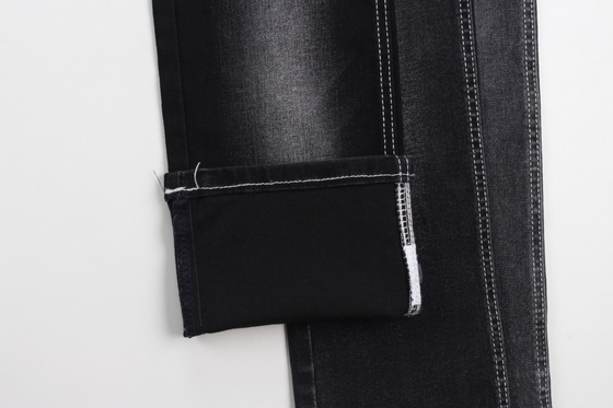 Venta caliente de 10 oz warp slub de alto estiramiento negro trasero tejido de denim tejido para jeans