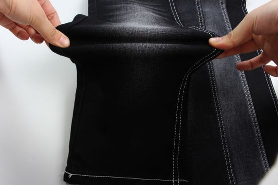 Tejido de denim de fondo negro