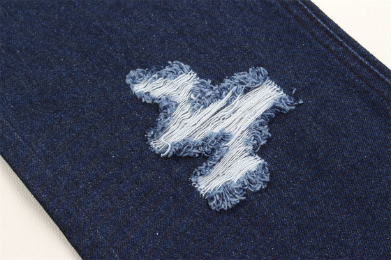 Fabricación a granel de tejidos de denim rígidos de color azul oscuro de algodón 100% para la fabricación de jeans