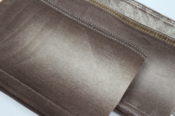 Tejido de denim de estiramiento de color marrón para mujeres hombre jeans de estiramiento bajo Precio competitivo de China Ciudad de Foshan