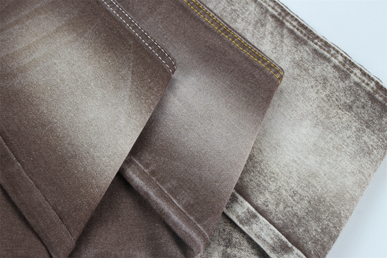 Tejido de denim de estiramiento de color marrón para mujeres hombre jeans de estiramiento bajo Precio competitivo de China Ciudad de Foshan