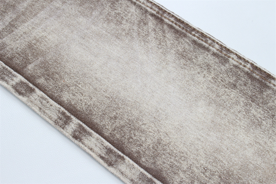 Tejido de denim de estiramiento de color marrón para mujeres hombre jeans de estiramiento bajo Precio competitivo de China Ciudad de Foshan