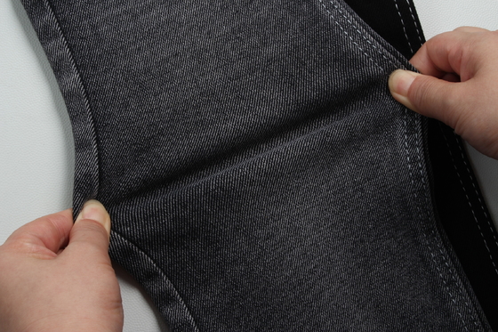 11 Oz Tejido de denim de estiramiento bajo para el hombre Trabajo Vestido de pantalones vaqueros Negro trasero Precio competitivo de Weilong Textile