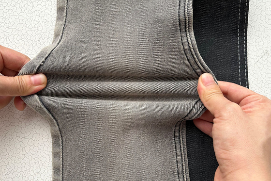 10 Oz Precio competitivo Precio agudo Color gris para hombre Jean estiramiento Tejido de denim de fábrica de China