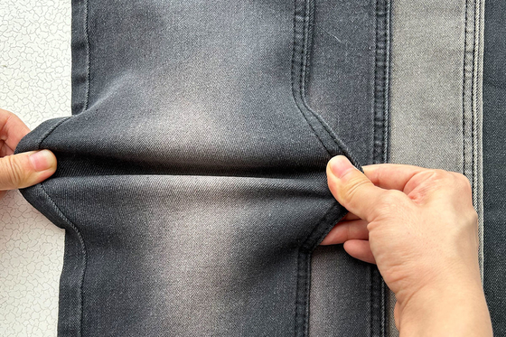 10 Oz Precio competitivo Precio agudo Color gris para hombre Jean estiramiento Tejido de denim de fábrica de China