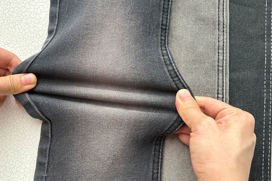 10 Oz Precio competitivo Precio agudo Color gris para hombre Jean estiramiento Tejido de denim de fábrica de China