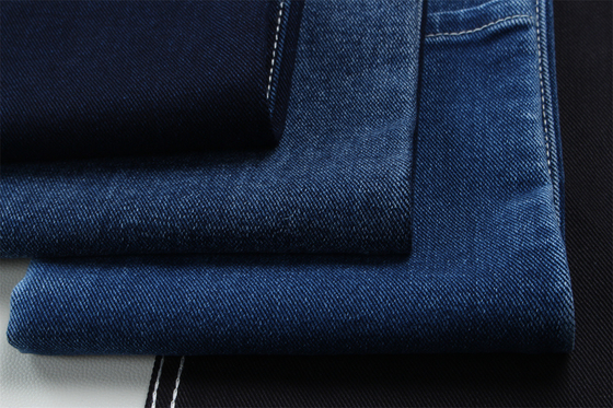 12 oz precio fuerte tejido de denim de bajo estiramiento para el trabajo del hombre usar jeans negro trasero precio competitivo de Weilong Textile