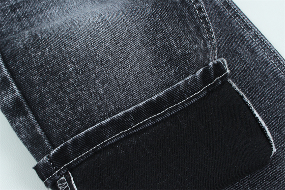 13.5 oz de tejido de denim pesado de baja estiradura para el trabajo del hombre usar jeans negro en la parte posterior