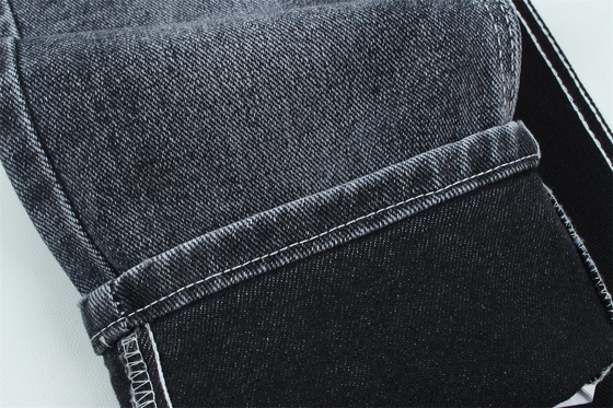 13.5 oz de tejido de denim pesado de baja estiradura para el trabajo del hombre usar jeans negro en la parte posterior