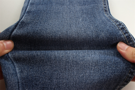 Por mayor 10.9 Oz Warp Slub High Stretch Tejido de Denim para Jeans