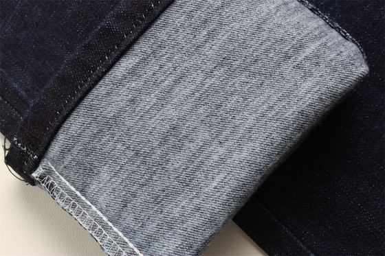 11.8 Oz Cross Slub de algodón mezclado Spandex Blue Denim Tejido Para Hombre Jeans Estiramiento Estilo de mercado de la India Desizing Fleecing