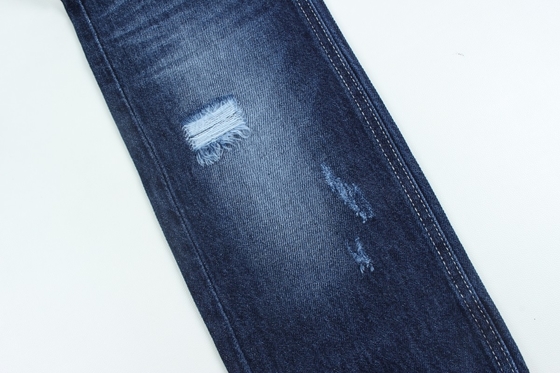 Venta al por mayor 7000 metros Stock 10.5 Oz 100% algodón rígido de jeans Tejido