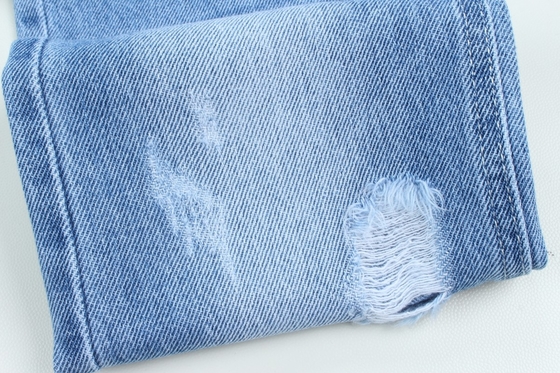 Venta al por mayor 7000 metros Stock 10.5 Oz 100% algodón rígido de jeans Tejido
