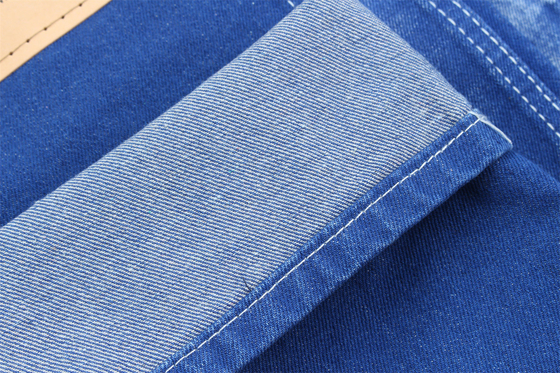 Vibrante y único color azul Tejido denim rígido 100% algodón ancho 180cm
