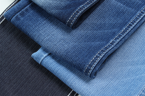 Tejido de denim nuevo de Herringbone M0562D Tejido de denim de estiramiento bajo para jeans de moda