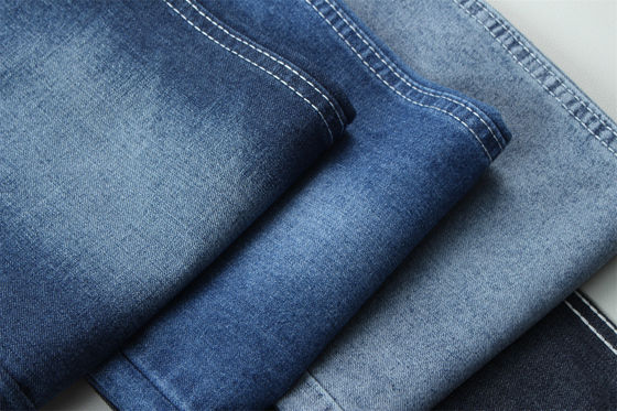 Buen precio Tendencia de moda reciclaje de algodón Tejido de denim 100% reciclaje de algodón 7 oz Ecológico en línea