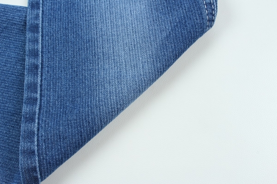 Tejido de jeans de estiramiento bajo de color azul oscuro de 10,3 oz.