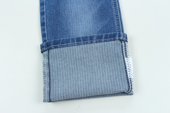 Tejido de jeans de estiramiento bajo de color azul oscuro de 10,3 oz.