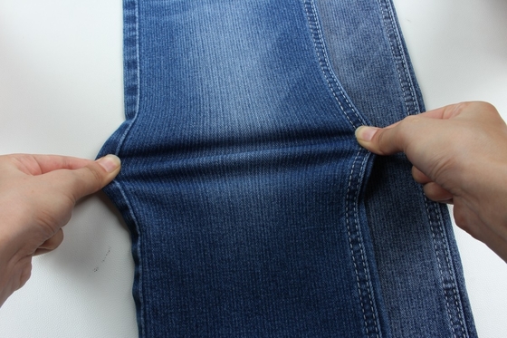 Tejido de jeans de estiramiento bajo de color azul oscuro de 10,3 oz.