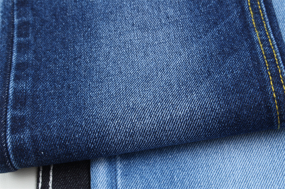 11.5 oz de tejido de denim rígido 100% C para el estilo de la marca Jeans estilo amigo del chico suave palpación Super color azul oscuro