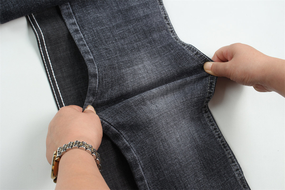 Tejido de denim de alta calidad negro oscuro de color cruzado de estiramiento de estiramiento de estiramiento para hombres jeans