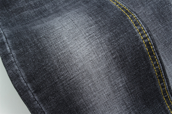 Tejido de denim de alta calidad negro oscuro de color cruzado de estiramiento de estiramiento de estiramiento para hombres jeans