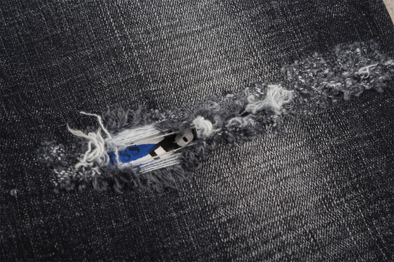 Tejido de denim de alta calidad negro oscuro de color cruzado de estiramiento de estiramiento de estiramiento para hombres jeans