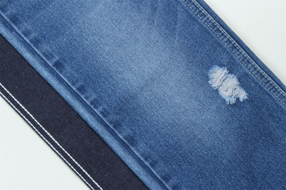 10 oz de tejido de denim rígido 100% C para el estilo de la marca Jeans estilo amigo del chico suave palmaría Super color azul oscuro