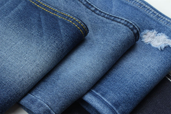 10 oz de tejido de denim rígido 100% C para el estilo de la marca Jeans estilo amigo del chico suave palmaría Super color azul oscuro