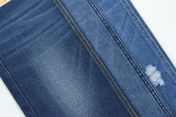 Buen precio 10 oz de tejido de denim rígido 100% C para el estilo de la marca Jeans estilo amigo del chico suave palmaría Super color azul oscuro en línea