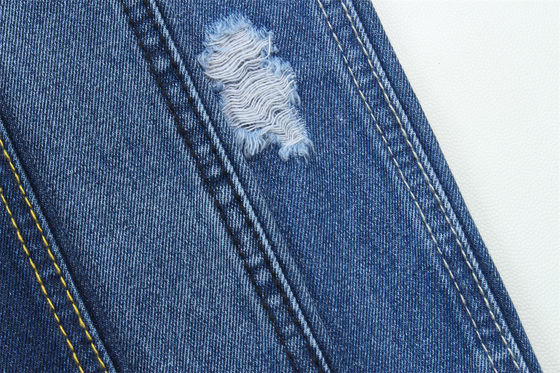 10 oz de tejido de denim rígido 100% C para el estilo de la marca Jeans estilo amigo del chico suave palmaría Super color azul oscuro