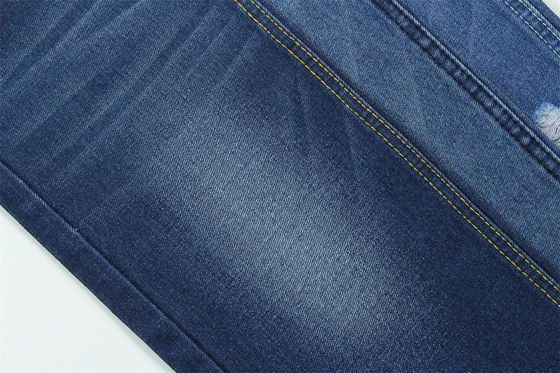 10 oz de tejido de denim rígido 100% C para el estilo de la marca Jeans estilo amigo del chico suave palmaría Super color azul oscuro