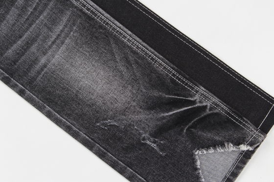 Tejido vaquero elástico jaspeado negro oscuro de calidad superior para jeans
