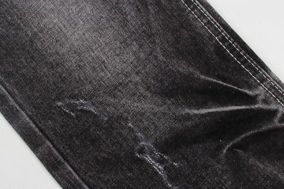 Tejido vaquero elástico jaspeado negro oscuro de calidad superior para jeans