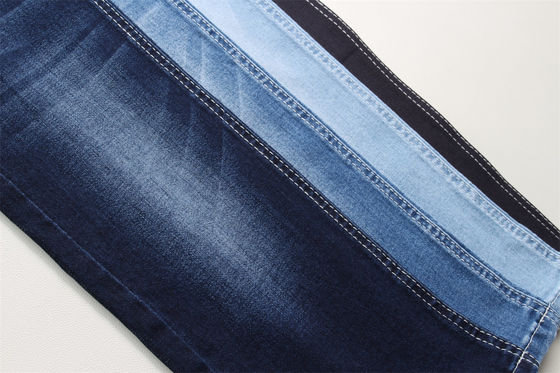 En stock 8.7 onzas de tejido de denim Lycra completo para niños y mujeres jeans