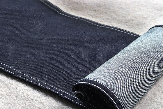 Tejido de denim rígido de algodón 100% azul oscuro para jeans