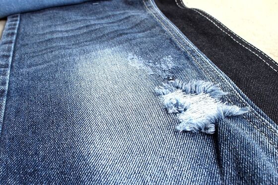 Tejido de denim rígido de algodón 100% azul oscuro para jeans