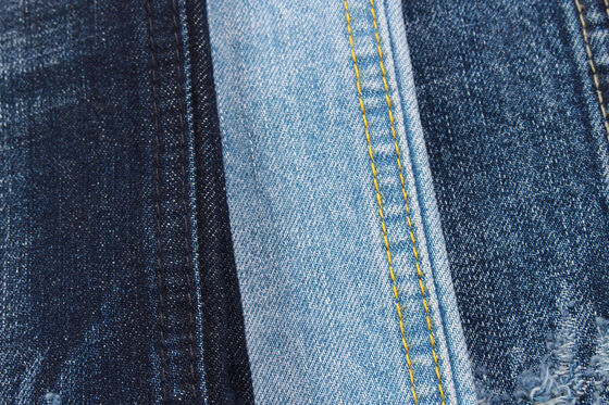 Vaqueros de mezclilla de algodón 100% de 12 oz con tejido cruzado y efecto jaspeado, tejido vaquero sanforizado