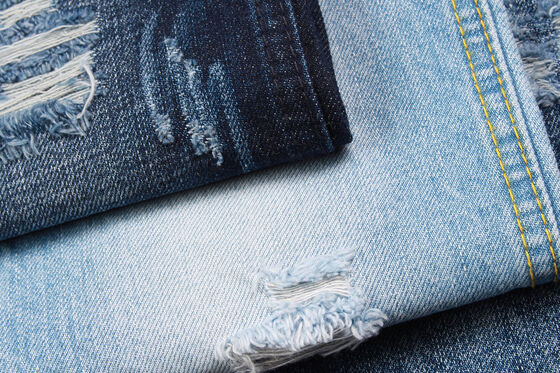 Vaqueros de mezclilla de algodón 100% de 12 oz con tejido cruzado y efecto jaspeado, tejido vaquero sanforizado