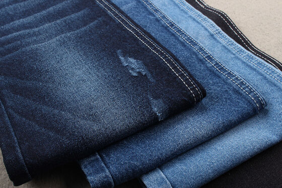 Nueva tendencia de moda: Tejido vaquero de algodón reciclado 12% algodón reciclado y 88% algodón 11 OZ Ecológico