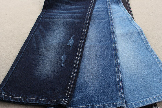 Nueva tendencia de moda: Tejido vaquero de algodón reciclado 12% algodón reciclado y 88% algodón 11 OZ Ecológico