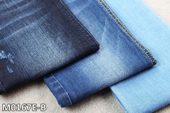 Material estupendo de los vaqueros de la gata de Dual Core de la tela del tejano azul oscuro del tinte de la cuerda