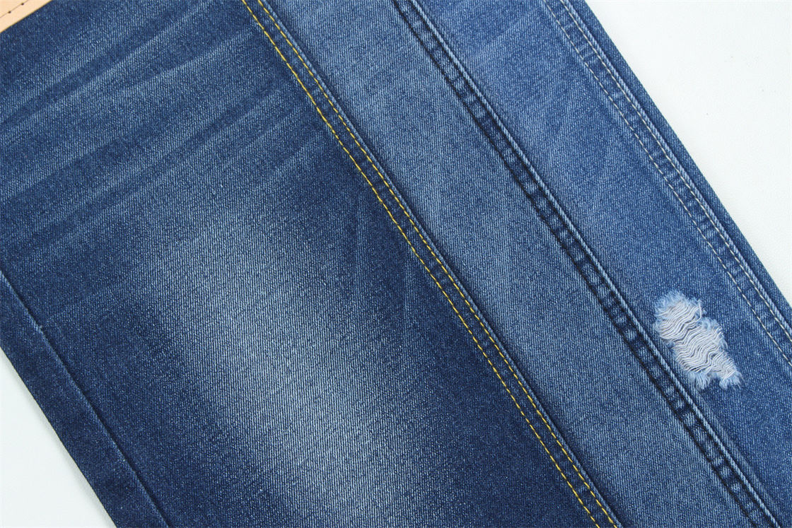 10 oz de tejido de denim rígido 100% C para el estilo de la marca Jeans estilo amigo del chico suave palmaría Super color azul oscuro