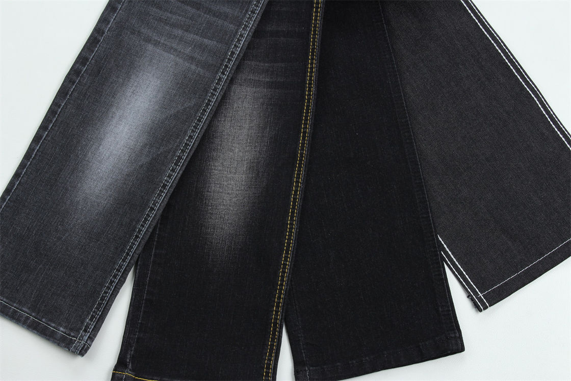 Color negro oscuro Tejido de denim para niños y mujeres Jeans