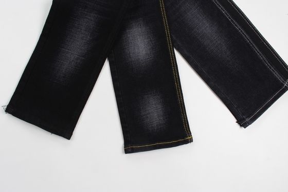 Buen precio 11.4 onzas negro y negro trasero cruzado de tejido de pantalón vaquero de moda en línea