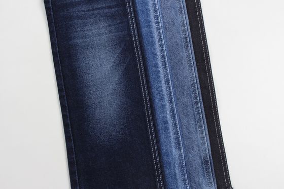 Buen precio Fabricación al por mayor de tejidos de denim rígidos de algodón 100% azul oscuro para jeans en línea