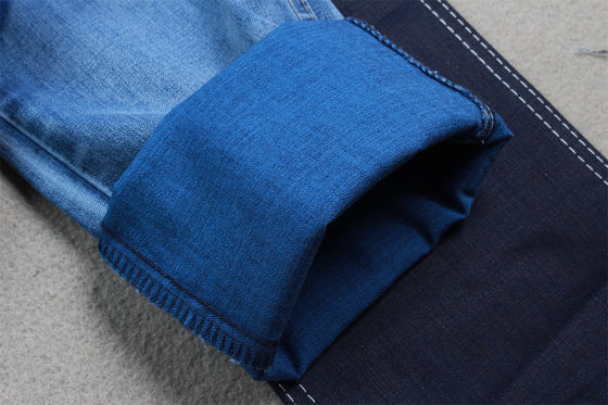 Buen precio 9-10 oz de tejido de denim Tencel para mujeres jeans de alta extensión para jeans de marca de alta calidad de Guangdong China fábrica en línea