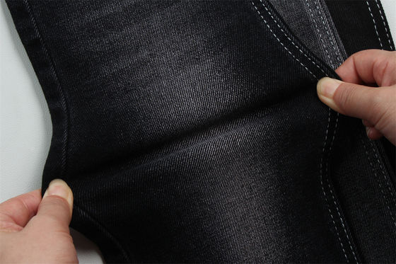 Buen precio 11 Oz Tejido de denim de estiramiento bajo para el hombre Trabajo Vestido de pantalones vaqueros Negro trasero Precio competitivo de Weilong Textile en línea