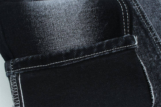 Buen precio 13.5 oz de tejido de denim pesado de baja estiradura para el trabajo del hombre usar jeans negro en la parte posterior en línea